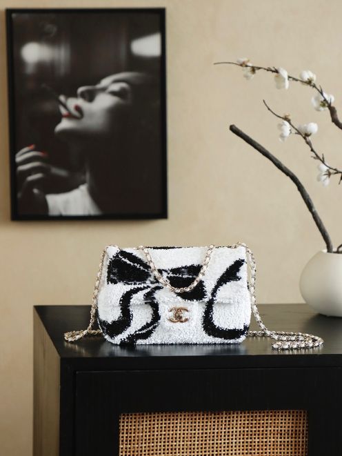 シャネル 格安 スパンコールチェーンショルダーバッグ バタフライモチーフ フラップ仕様 長年の実績