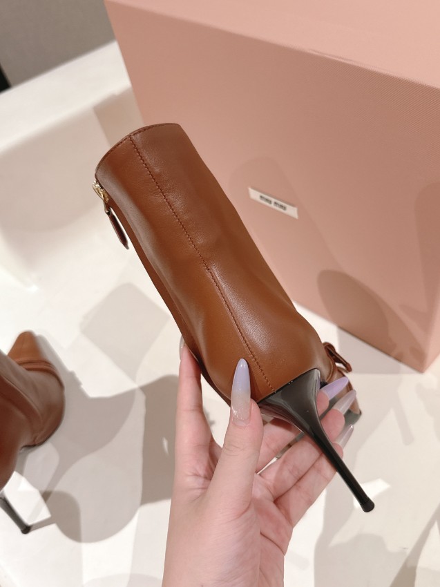 ミュウミュウ ブーツ 2025新作 ブランド コピー 安全通販 高級感仕上げ 本格派モデル 上質本革使用 安心サイト 発送保証_4